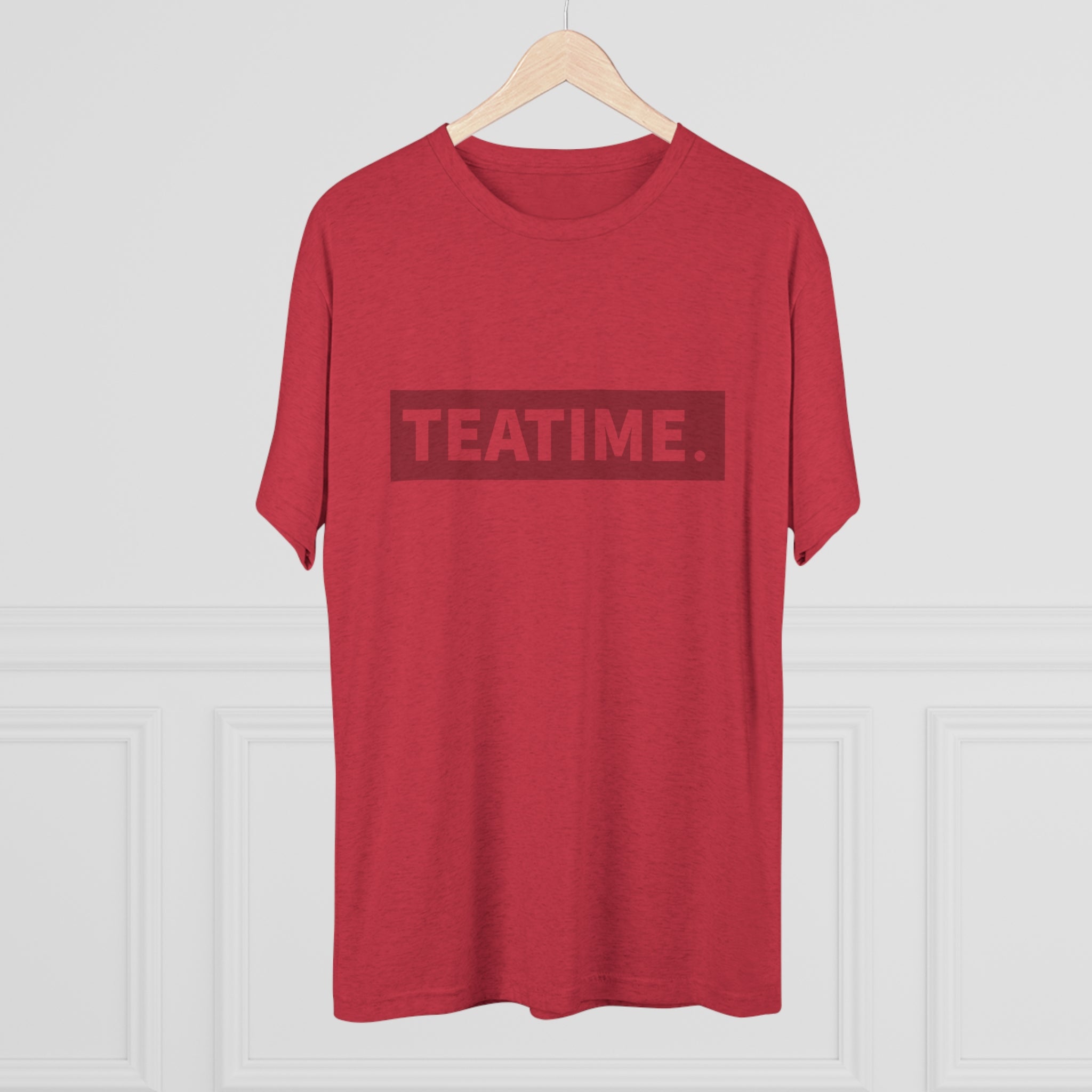 Red graphic tee featuring the word "TEATIME." prominently displayed in a bold, modern font.