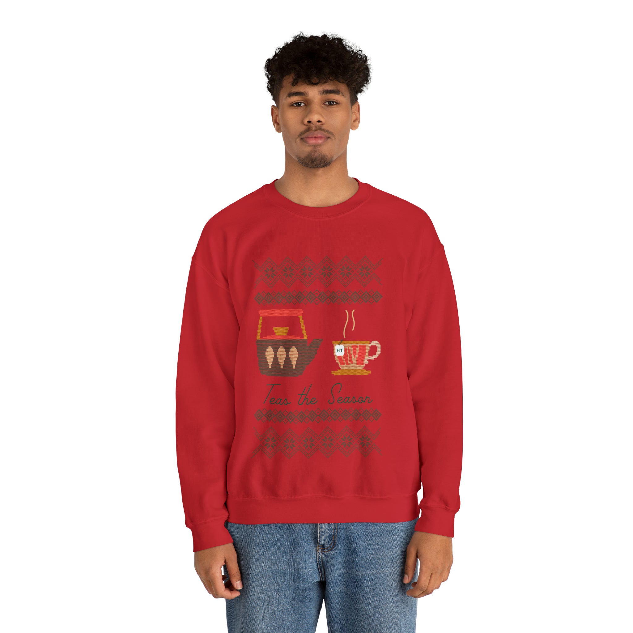 Red holiday sweater featuring "Teas The Season" graphic with tea cups and festive designs. Perfect for winter celebrations.