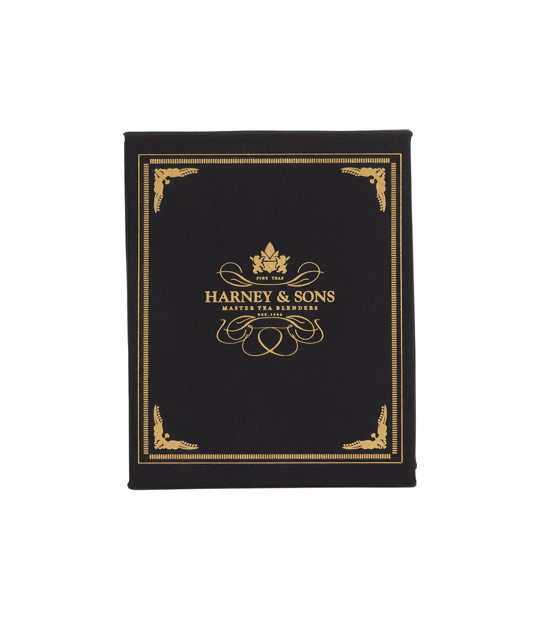 Harney & Sons black teabag sampler box featuring elegant gold lettering and decorative design.
