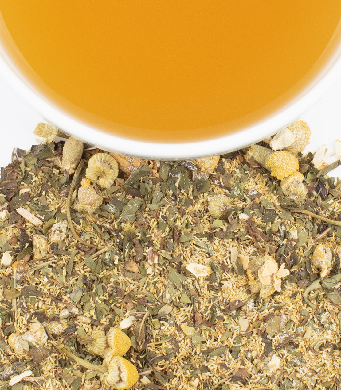 Chamomile Mint tea blend with dried herbs and flowers, featuring a cup of brewed tea above.