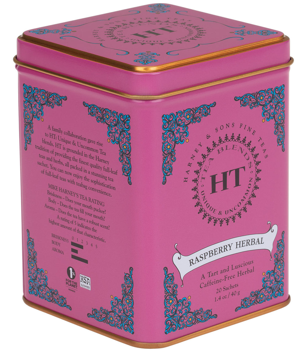 Pink tin container of Raspberry Herbal tea by Harney & Sons, featuring intricate designs and product details.