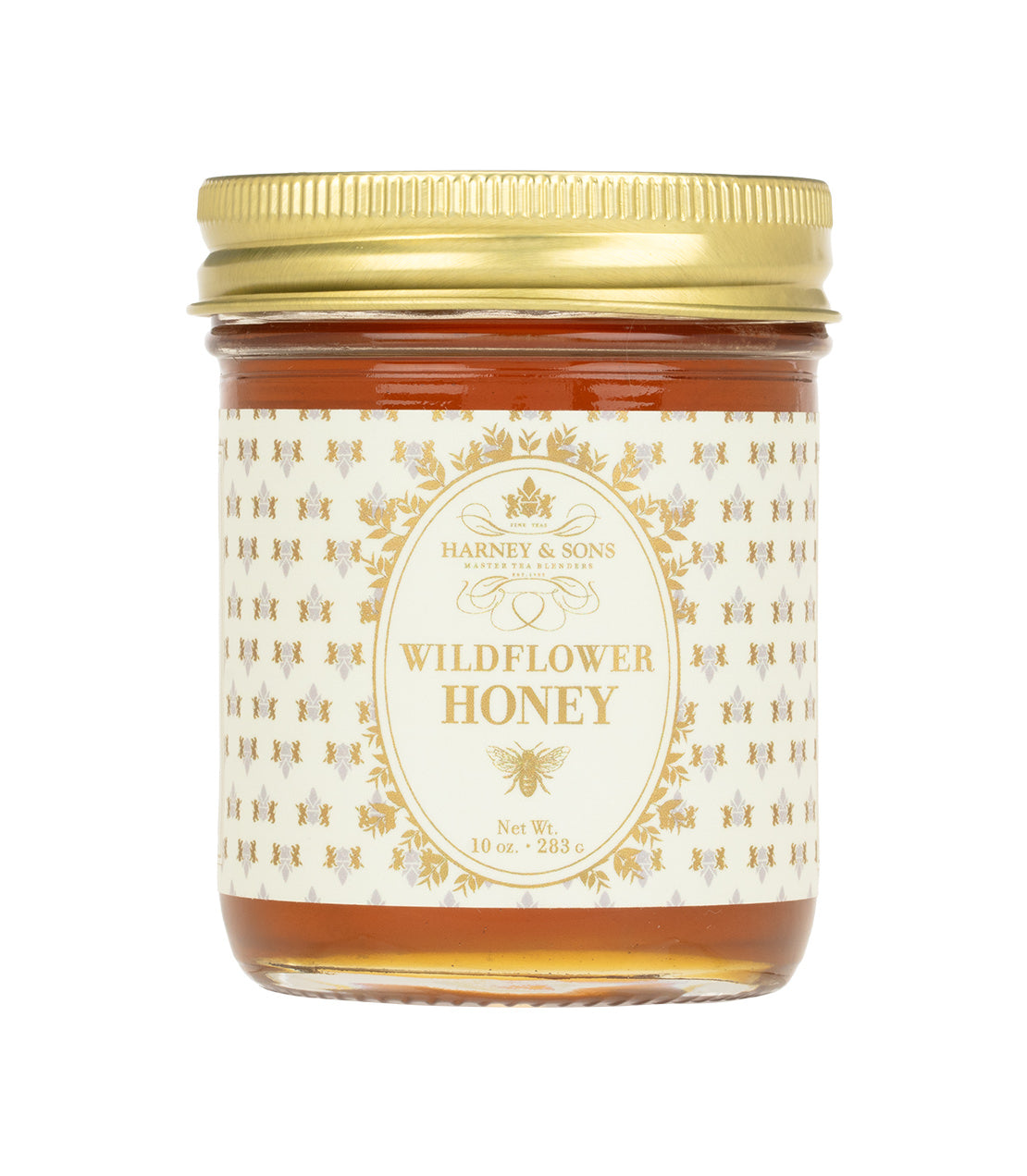 Harney & Sons Wildflower Honey jar, 10 oz, featuring a gold lid and decorative label with floral design.