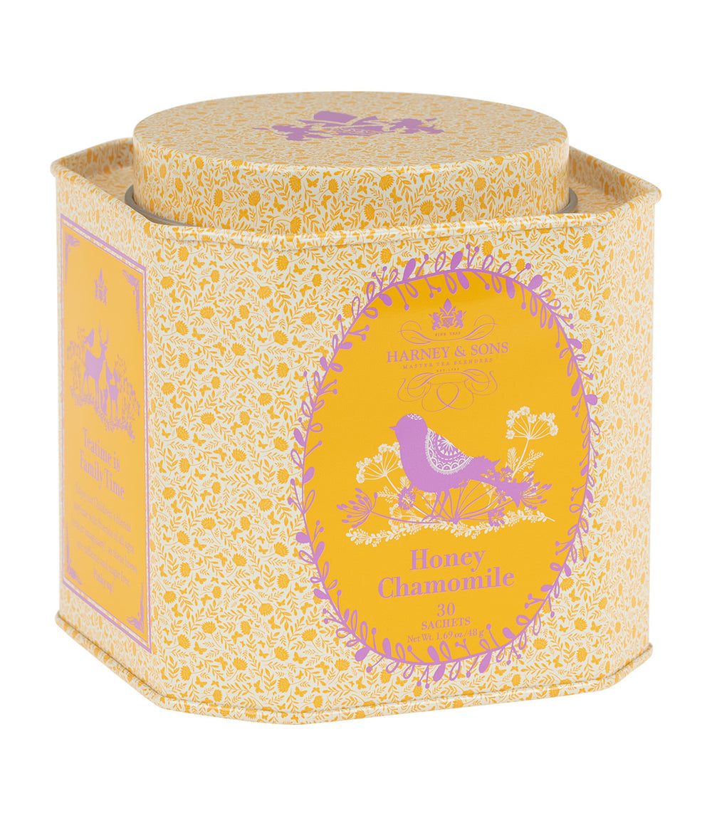 Honey Chamomile tea tin featuring a floral design, containing 30 sachets for a soothing herbal experience.