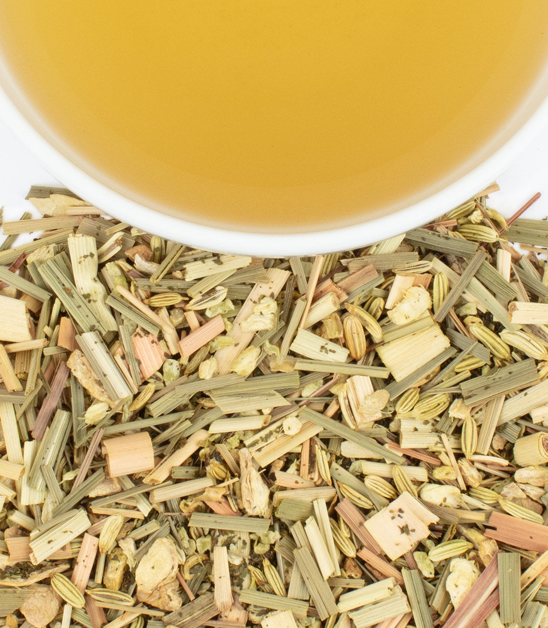 Coconut Mint herbal tea sachets with lemongrass and spices, displayed with brewed tea in a cup.