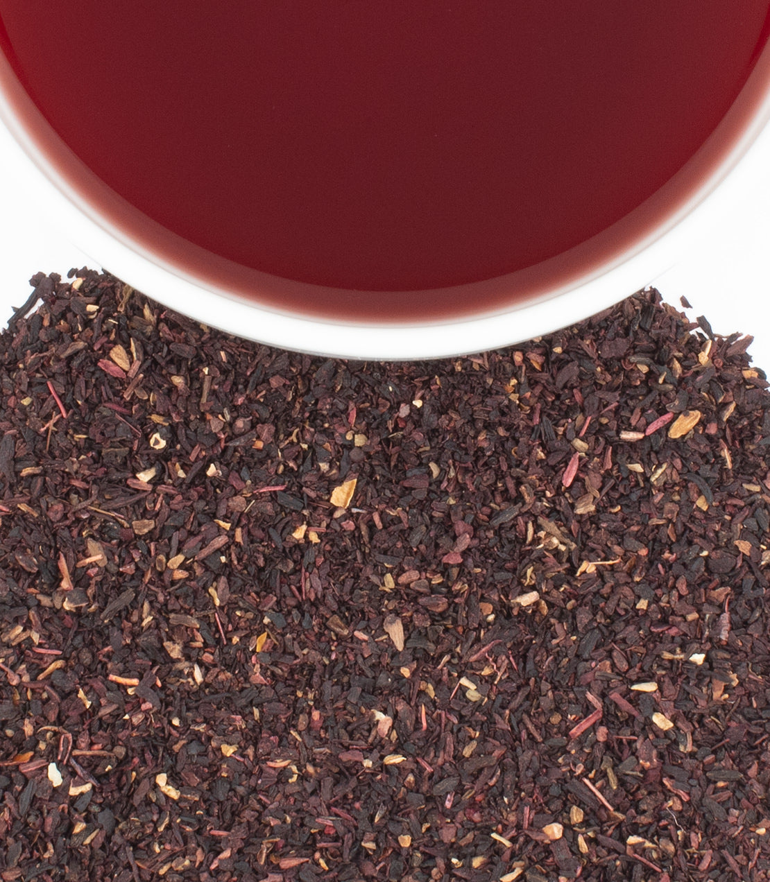 Hibiscus tea sachets in a bag of 50, with dried hibiscus flowers and brewed tea in a cup.