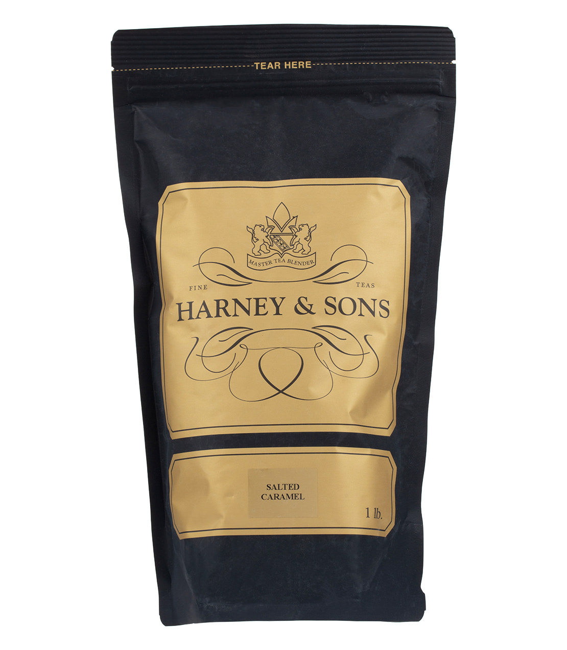 Black packaging of Harney & Sons Salted Caramel tea, featuring gold accents and a tear-off top.