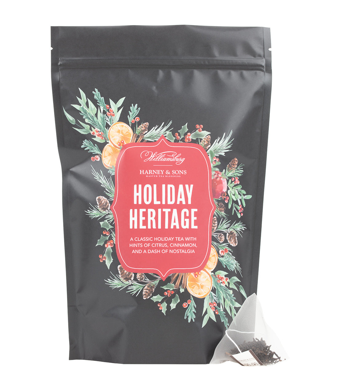 Harney & Sons Fine Teas- Colonial Williamsburg- Holiday Heritage- Bag of 50 Sachets- Black Bag with red badge and festive decorations- Photographed with a pyramid sachet