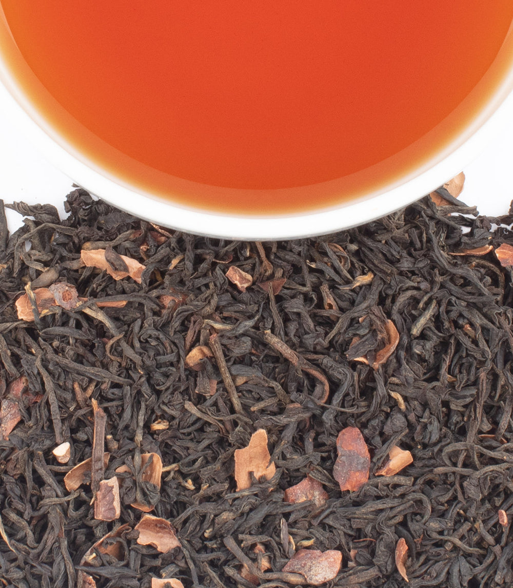 Harney & Sons Fine Teas- Colombian Cocoa Kisses- Cup with tea and black tea leaves and cocoa pieces