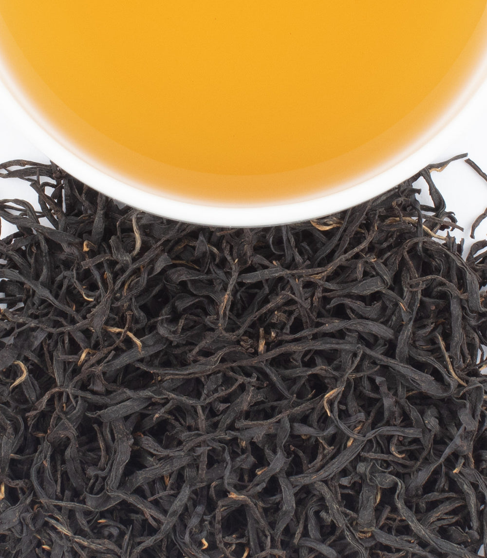 Harney & Sons Fine Teas- Hunan Wild- Cup of tea and Leaves from above