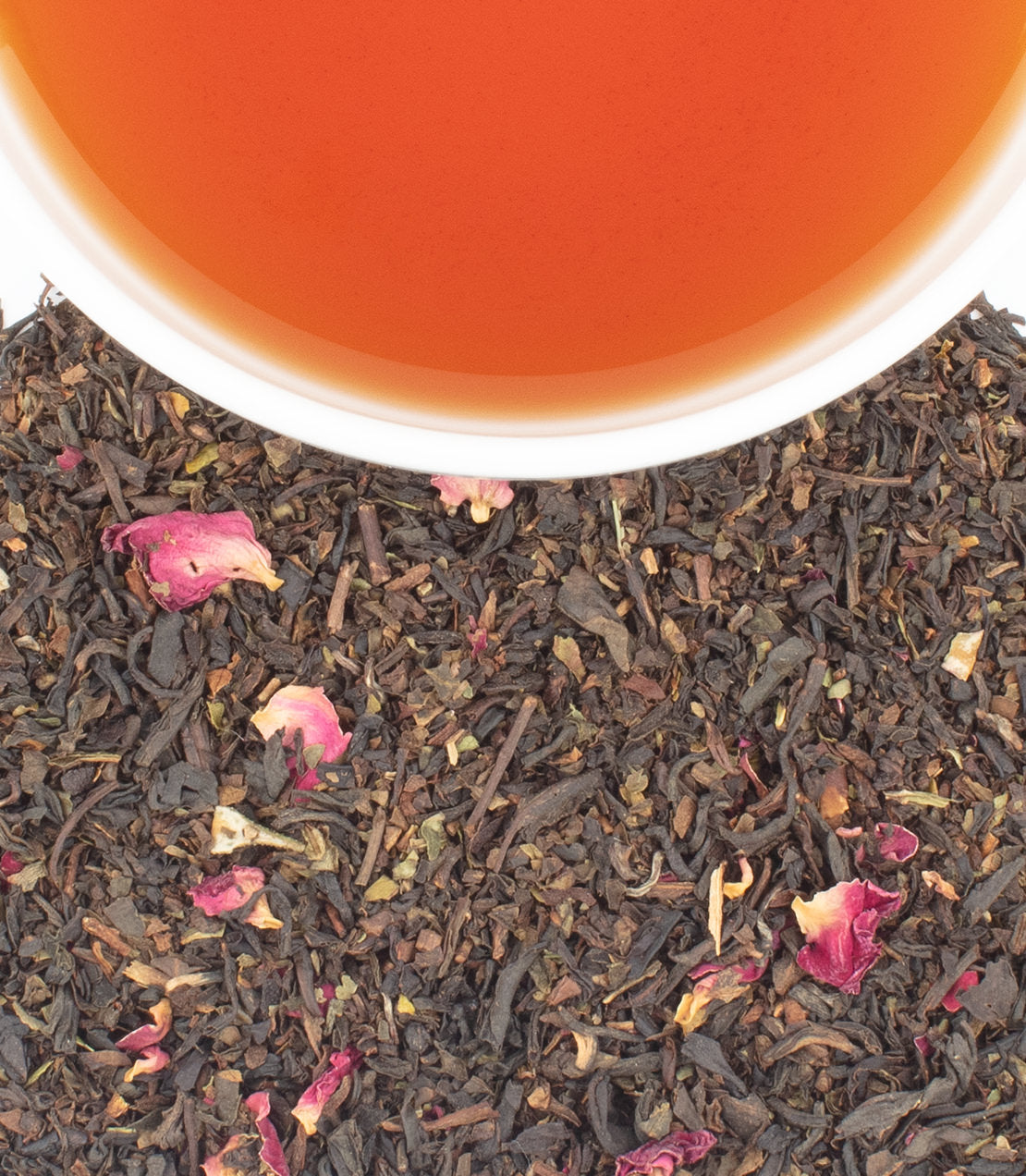 Harney & Sons Fine Teas- Pemberley Grey- Overhead shot of cup of tea by tea leaves