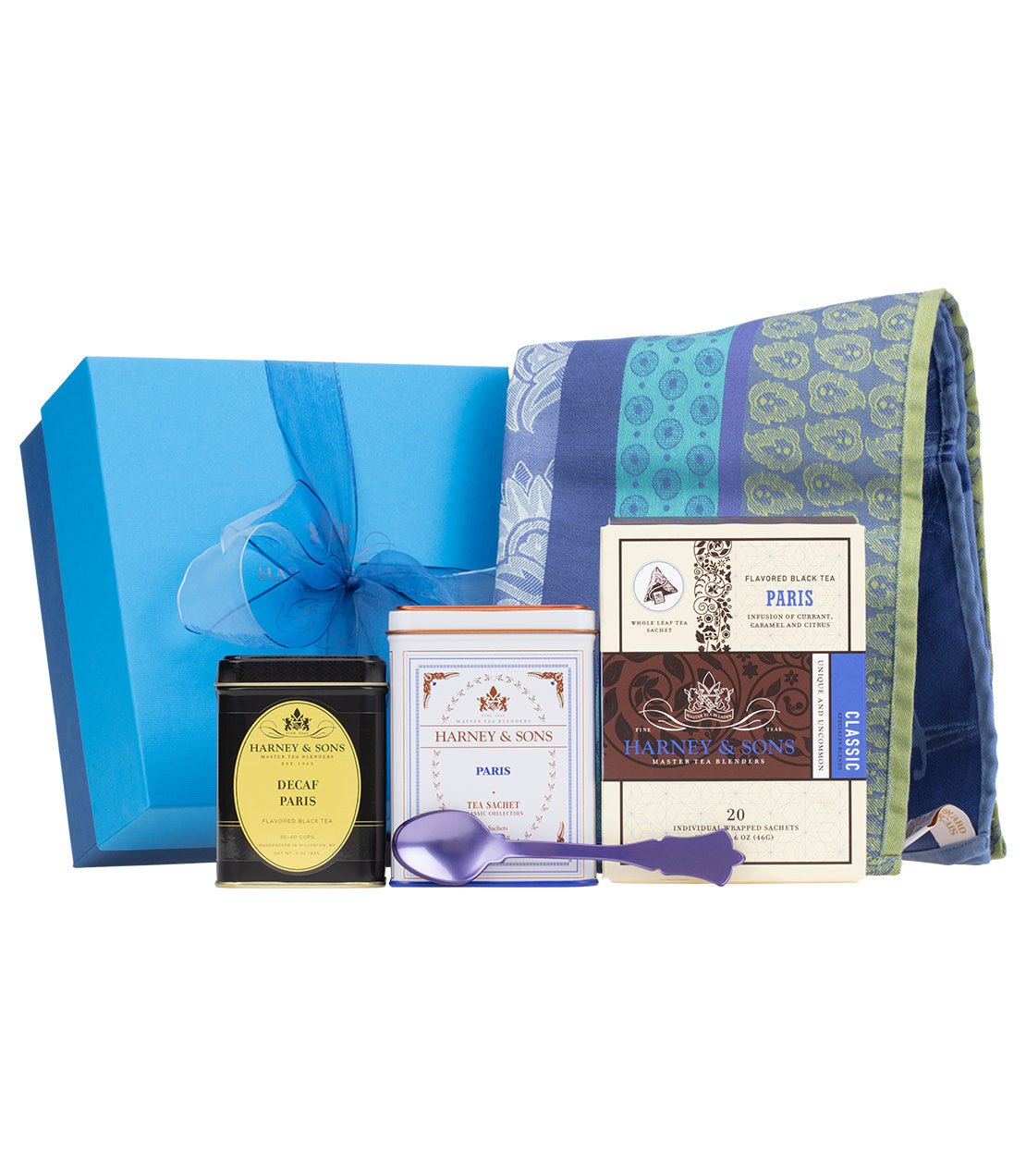 Harney & Sons Fine Teas- Paris Tea Gift set featuring tea, a spoon, and a decorative towel in a blue gift box with a ribbon.