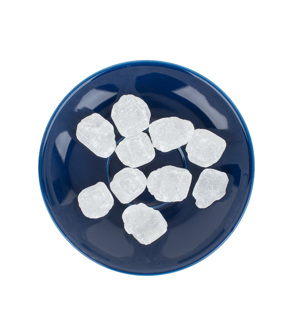 Kluntje Kandis- Rock Sugar- Overhead shot of rock sugar on blue saucer