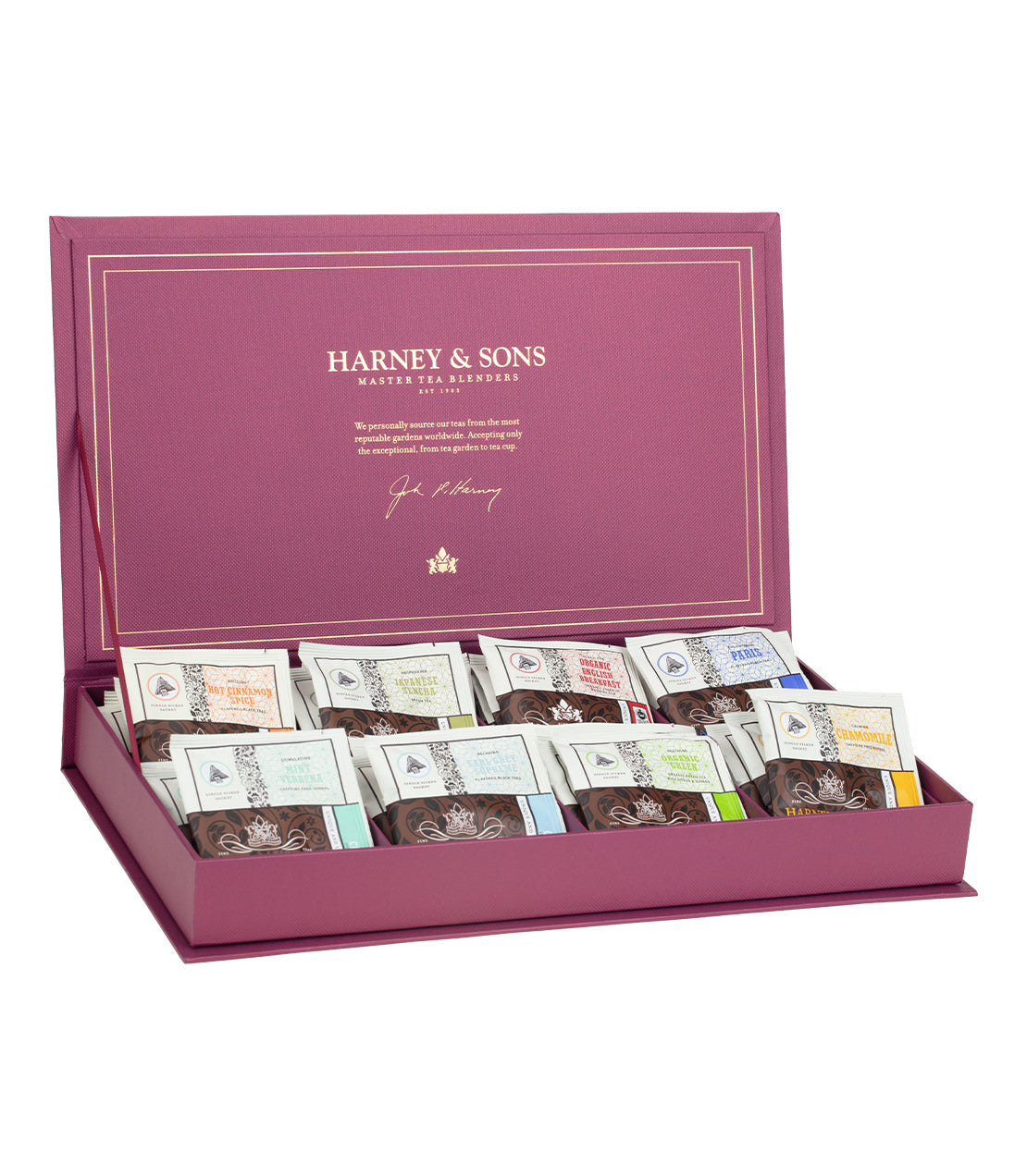 An open purple box from Harney & Sons, master tea blenders, displays an assortment of individually packaged sachets