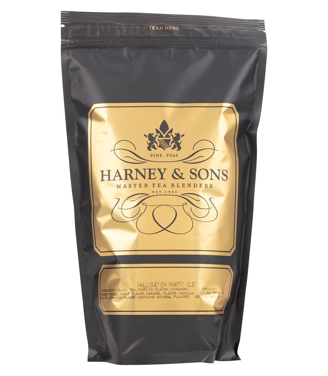 A black pouch of Harney & Sons "Hallowe'en Party" flavored tea, featuring a gold label with ingredients and branding and a tear line on top