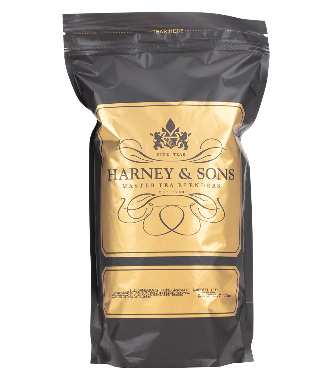 A black resealable stand-up pouch of Williamsburg Pomegranate Garden Harney & Sons Fine Tea with a large metallic gold label on the front, photographed against a plain white background.