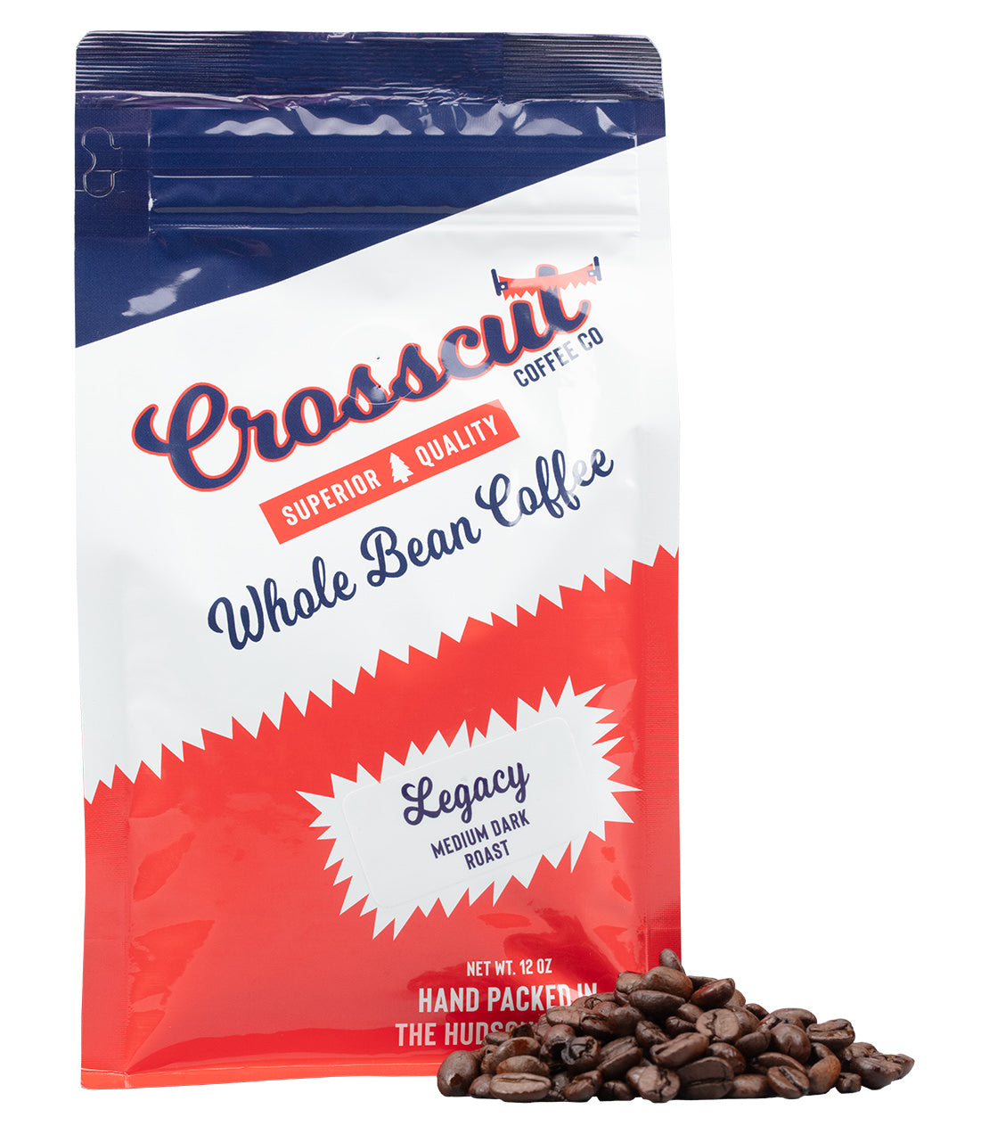 A bag of Crosscut Coffee Co. Legacy Medium Dark Roast whole bean coffee, shown in a red, white, and blue stand-up pouch with a small pile of roasted coffee beans in front, on a white background.