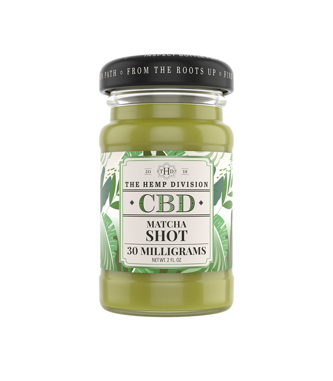 The Hemp Division Matcha Shot, a 2 fl oz glass jar with a black lid and a white tropical leaf label, on a white background.
