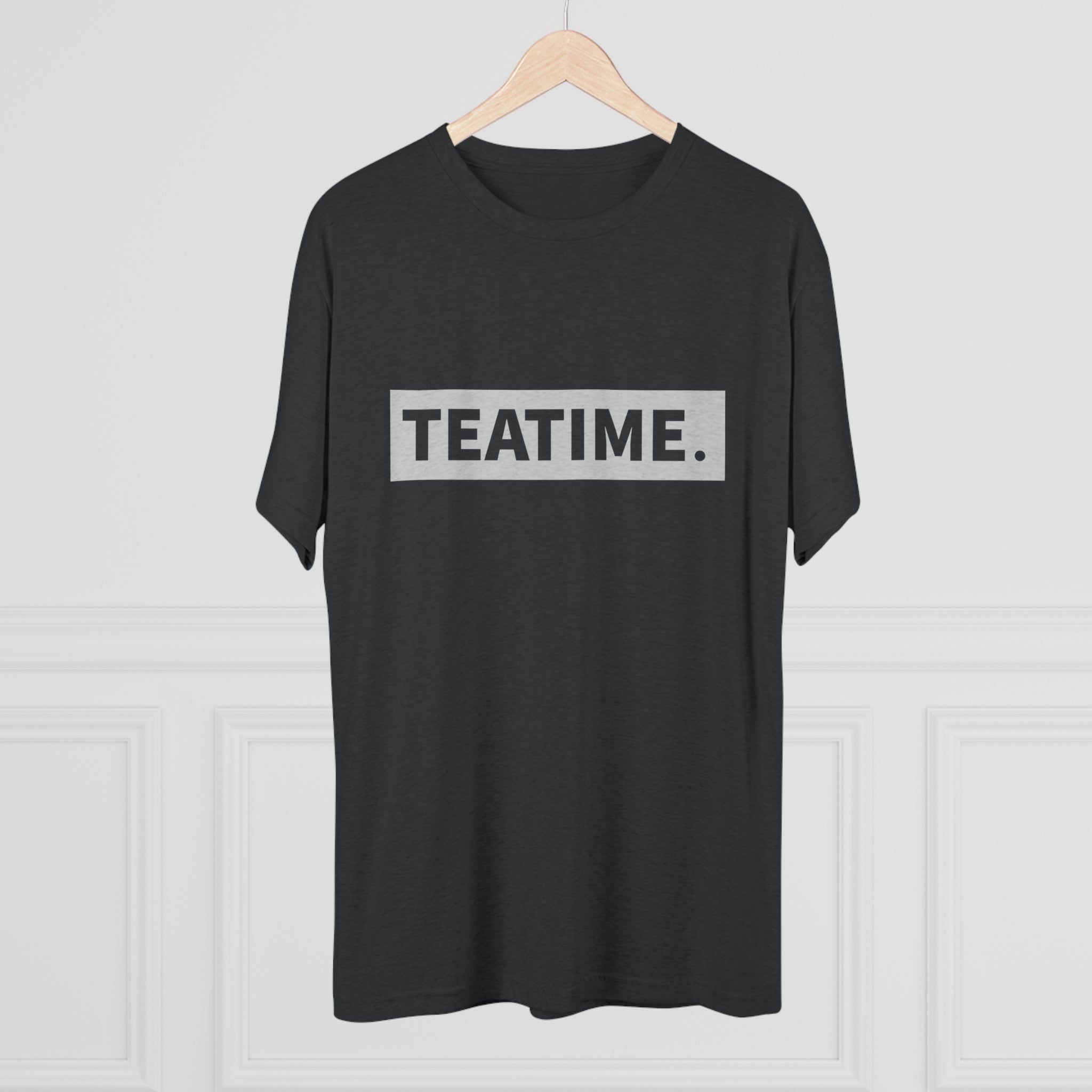 Black graphic tee featuring the word "TEATIME." in bold, silver lettering on a simple background.