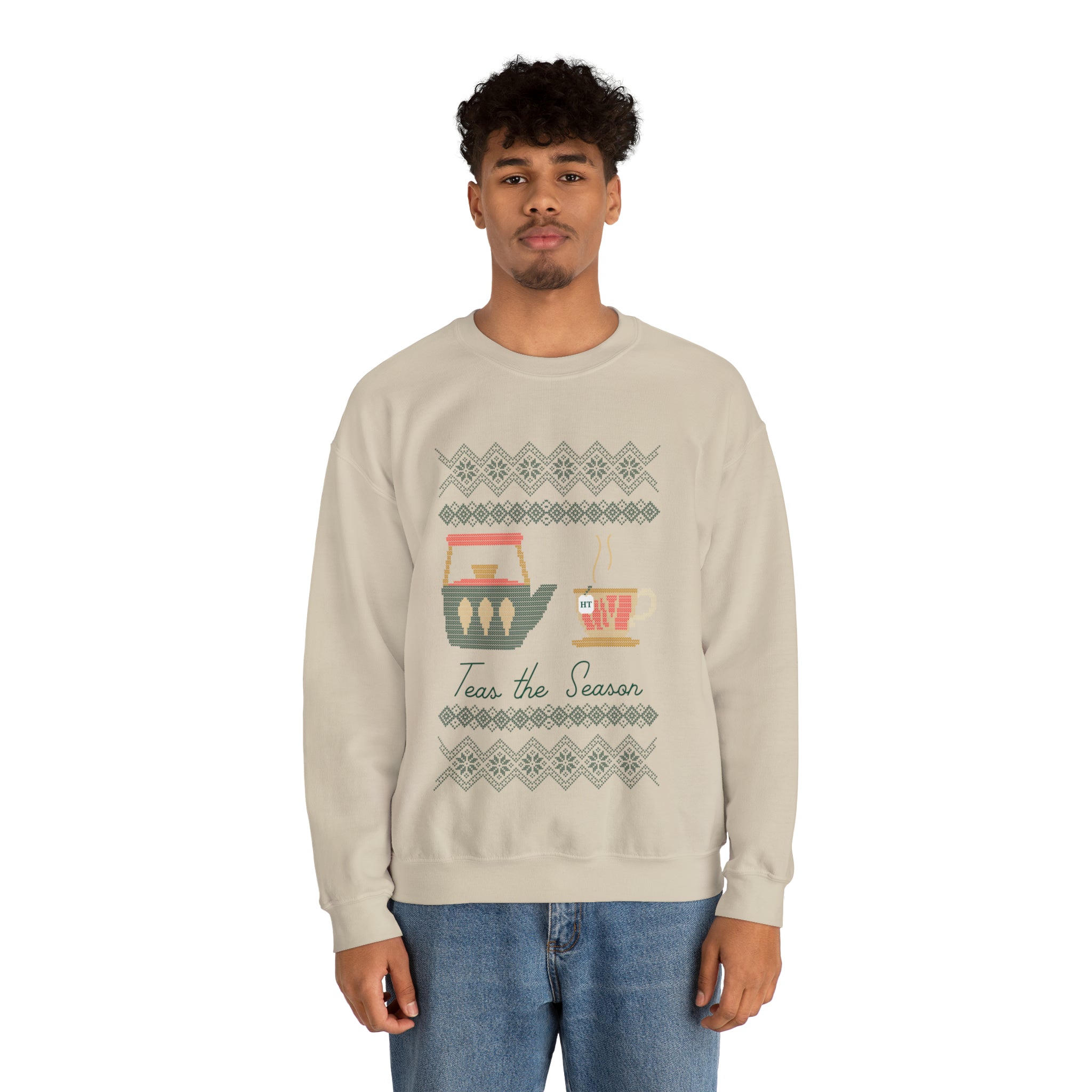 Light beige holiday sweater featuring a festive tea-themed graphic and cozy design, perfect for winter celebrations.