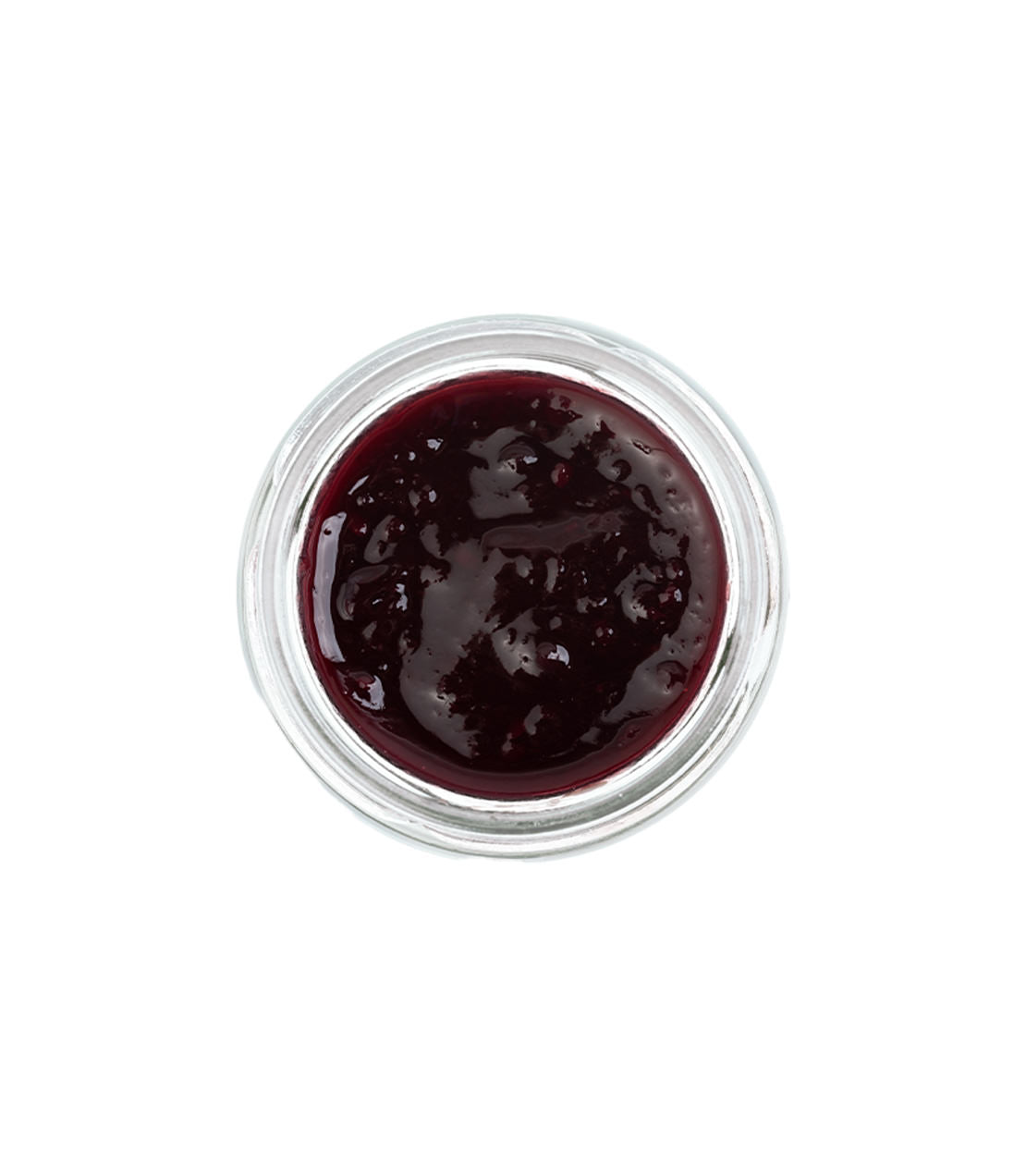 Assorted tea jams in a glass jar, showcasing a rich, dark berry color and smooth texture.