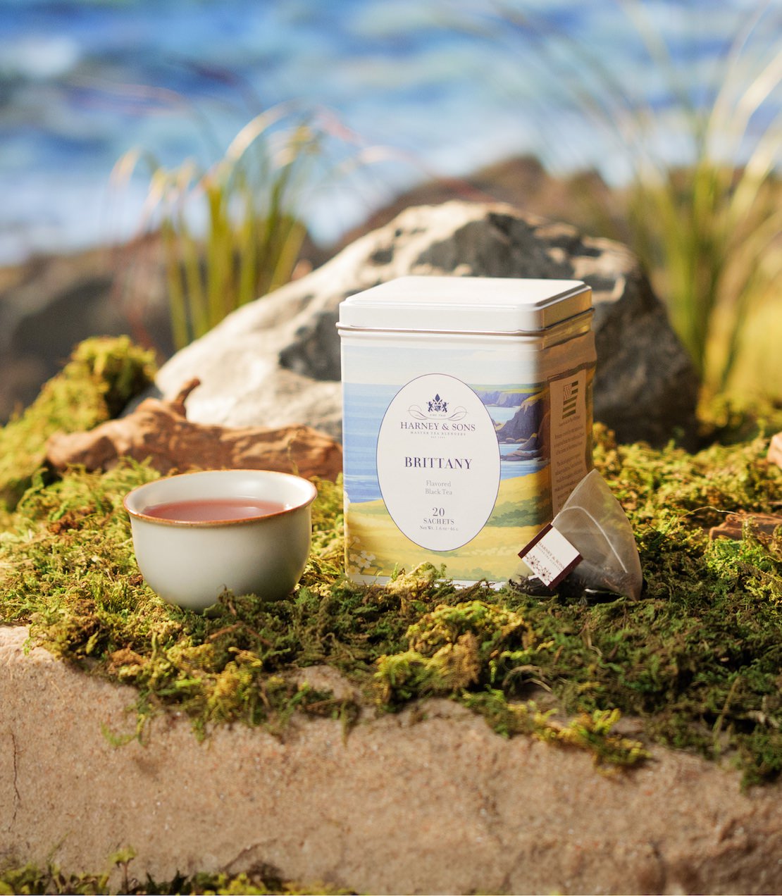 Brittany tea tin with a scenic label on a natural background.