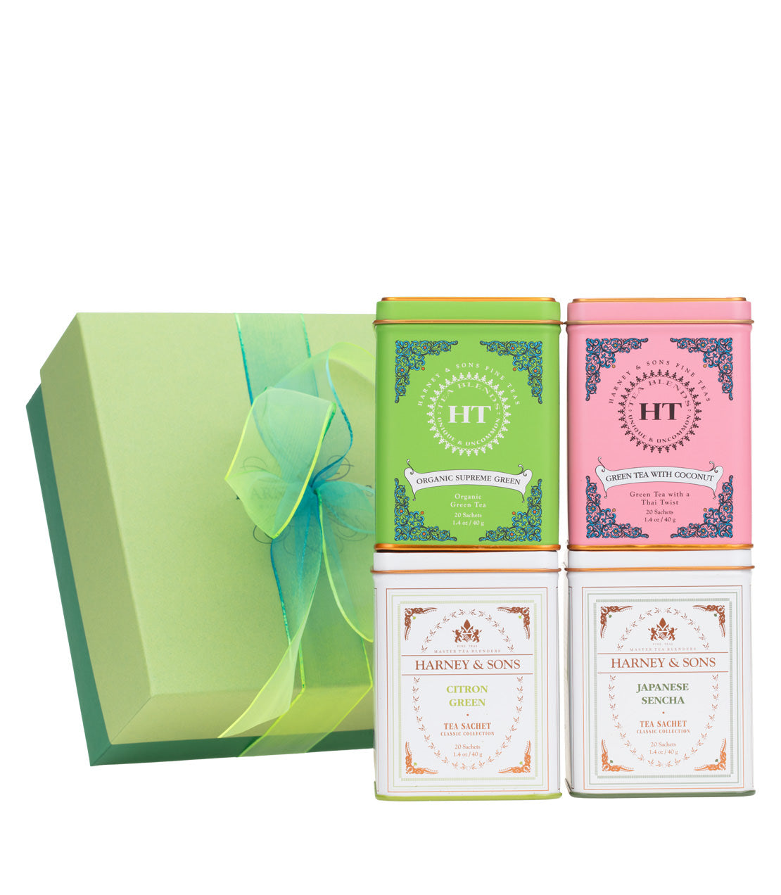 Green tea gift set featuring four decorative tins of various flavors, elegantly packaged in a green box with a ribbon.