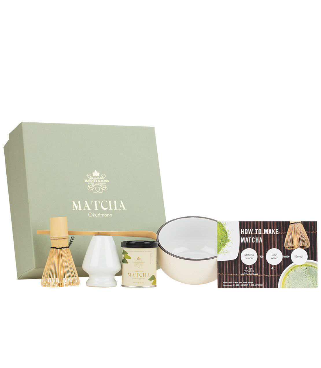 Matcha tea gift set featuring a sage green box, bamboo whisk, white ceramic scoop, small jar, matching bowl, and a 'How to Make Matcha' booklet on a white background.