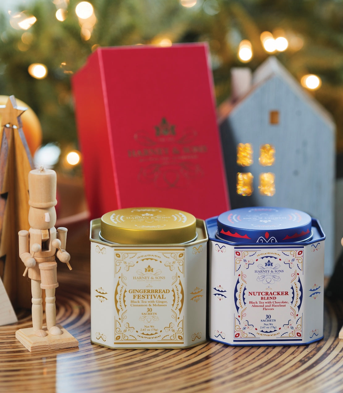 Nutcracker Duo Gift featuring Gingerbread Festival and Nutcracker Blend tea tins, with festive decorations in the background.