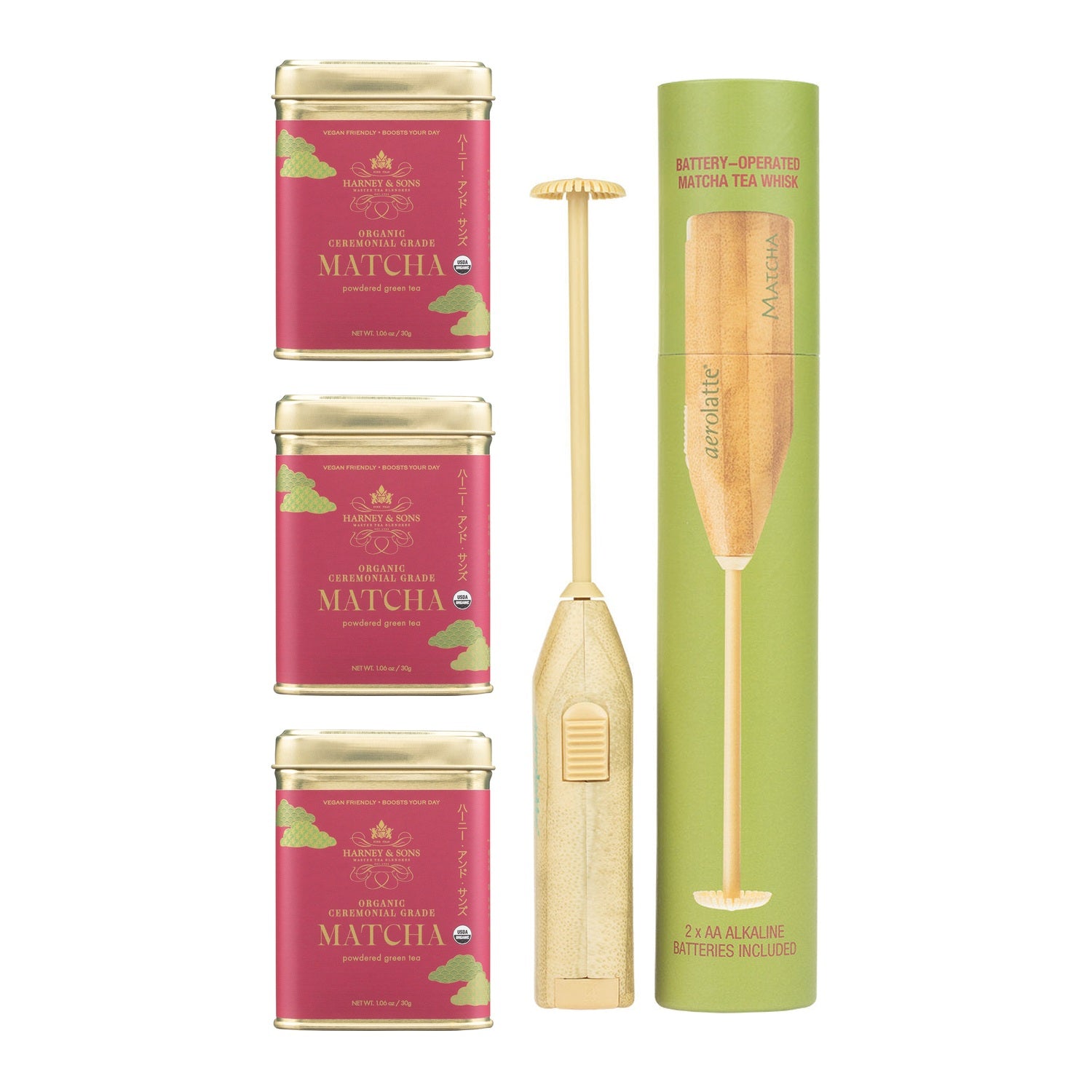 Three tins of organic ceremonial grade matcha beside an electric frother