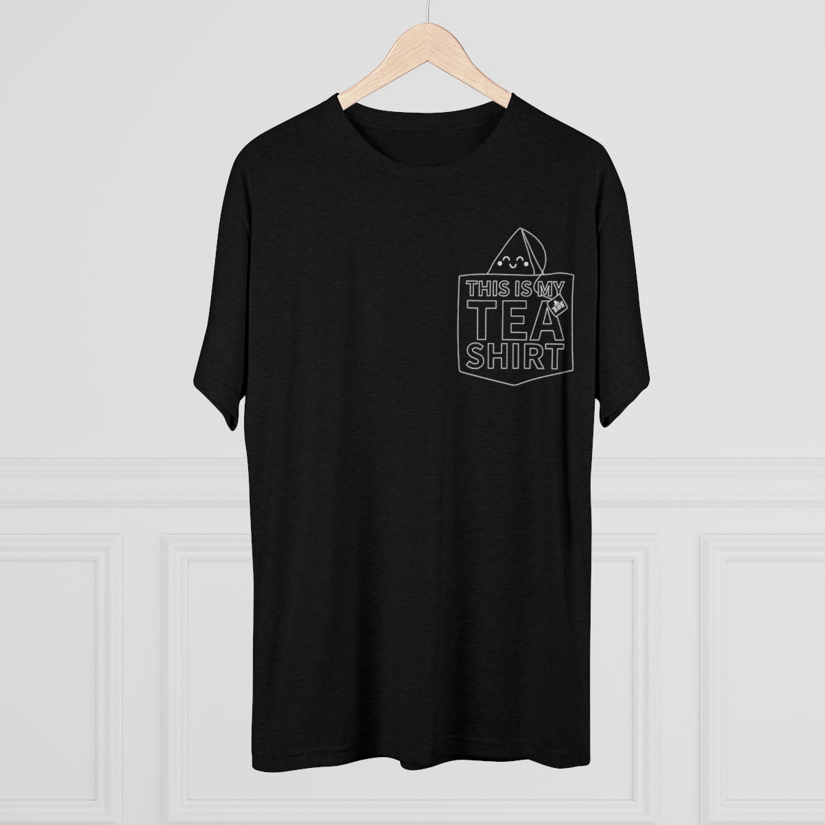 Black graphic tee featuring the text "This Is My Tea Shirt" with a tea bag illustration on the pocket.