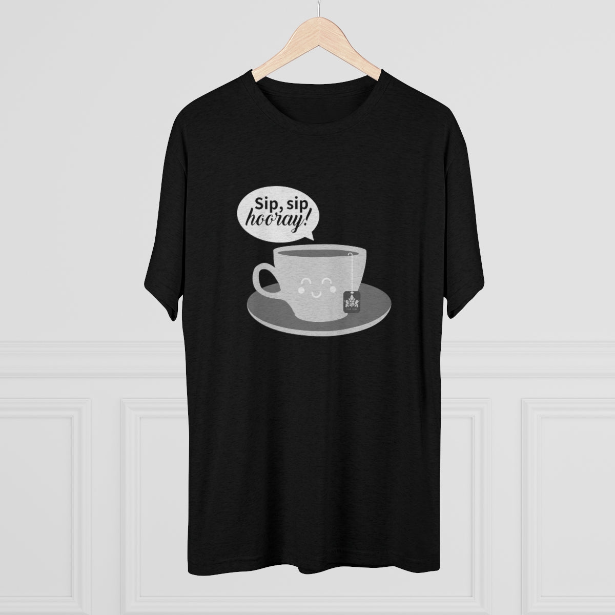 Black graphic tee featuring a smiling coffee cup and the text "Sip, sip hooray!" on a light background.