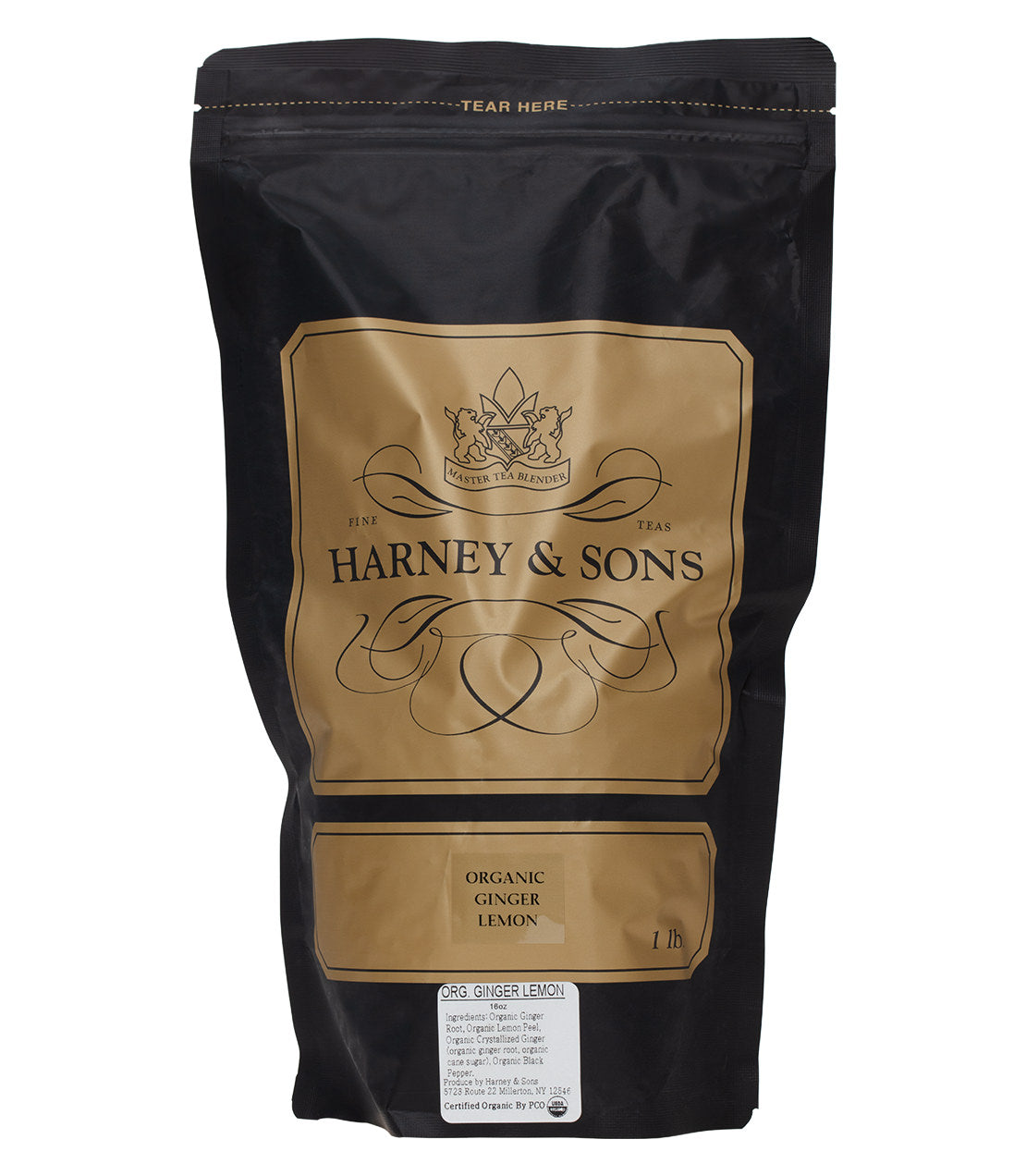 Black packaging of Harney & Sons Organic Ginger Lemon tea, featuring gold accents and product details.
