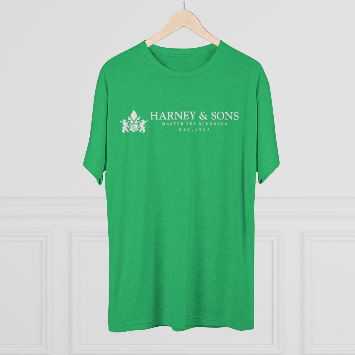 Green graphic tee featuring "Harney & Sons Masters Tea Blenders Est. 1983" printed on the front.