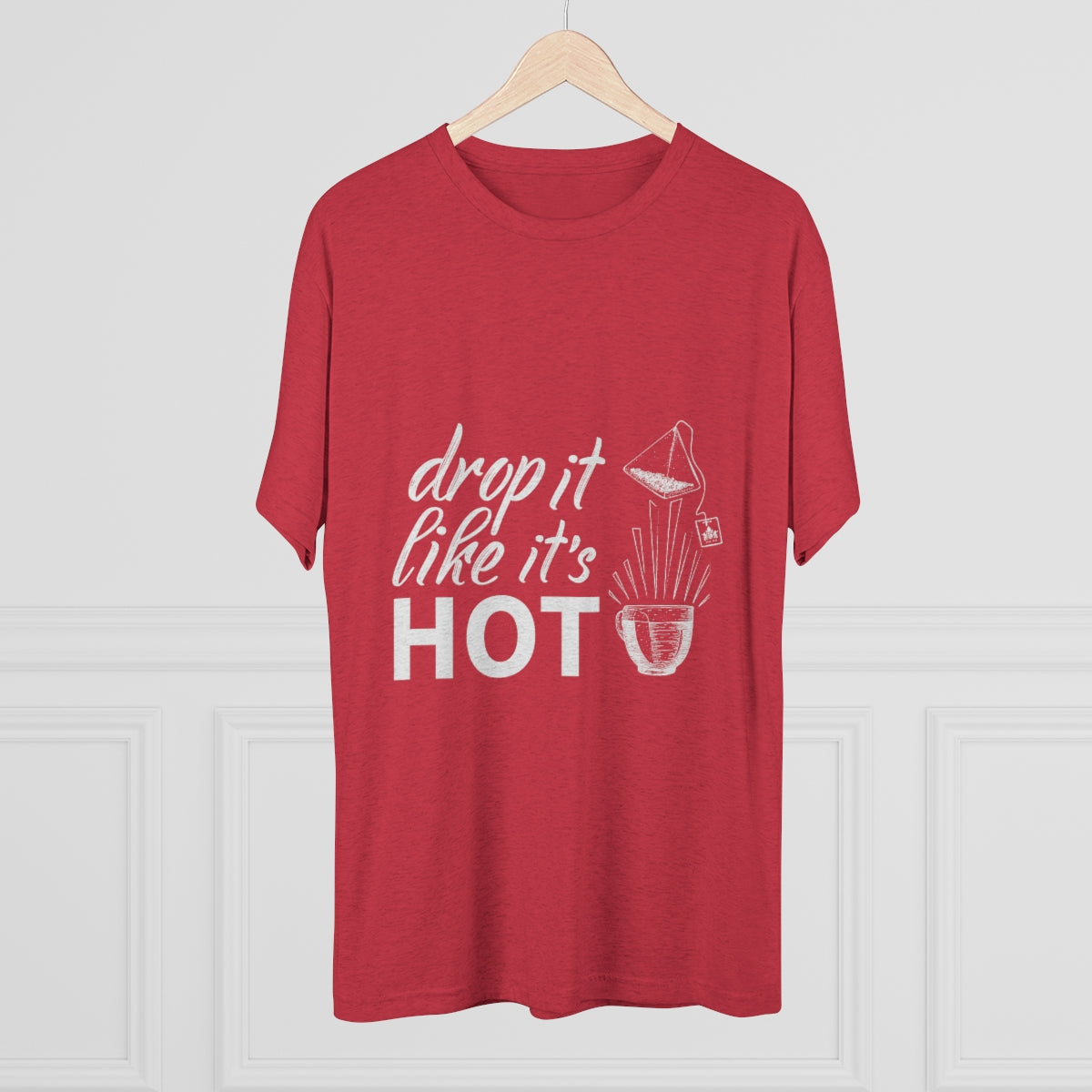 Red graphic tee featuring the phrase "drop it like it's HOT" with a playful design. Perfect for casual wear.