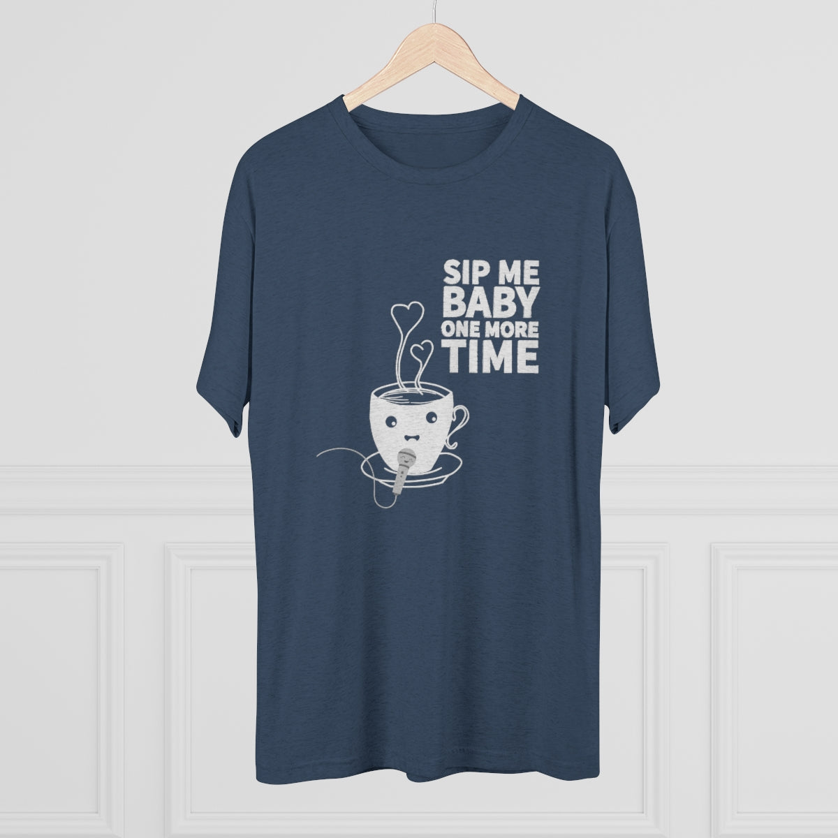 Navy graphic tee featuring a cute coffee cup design with the text "Sip Me Baby One More Time." Perfect for coffee lovers.