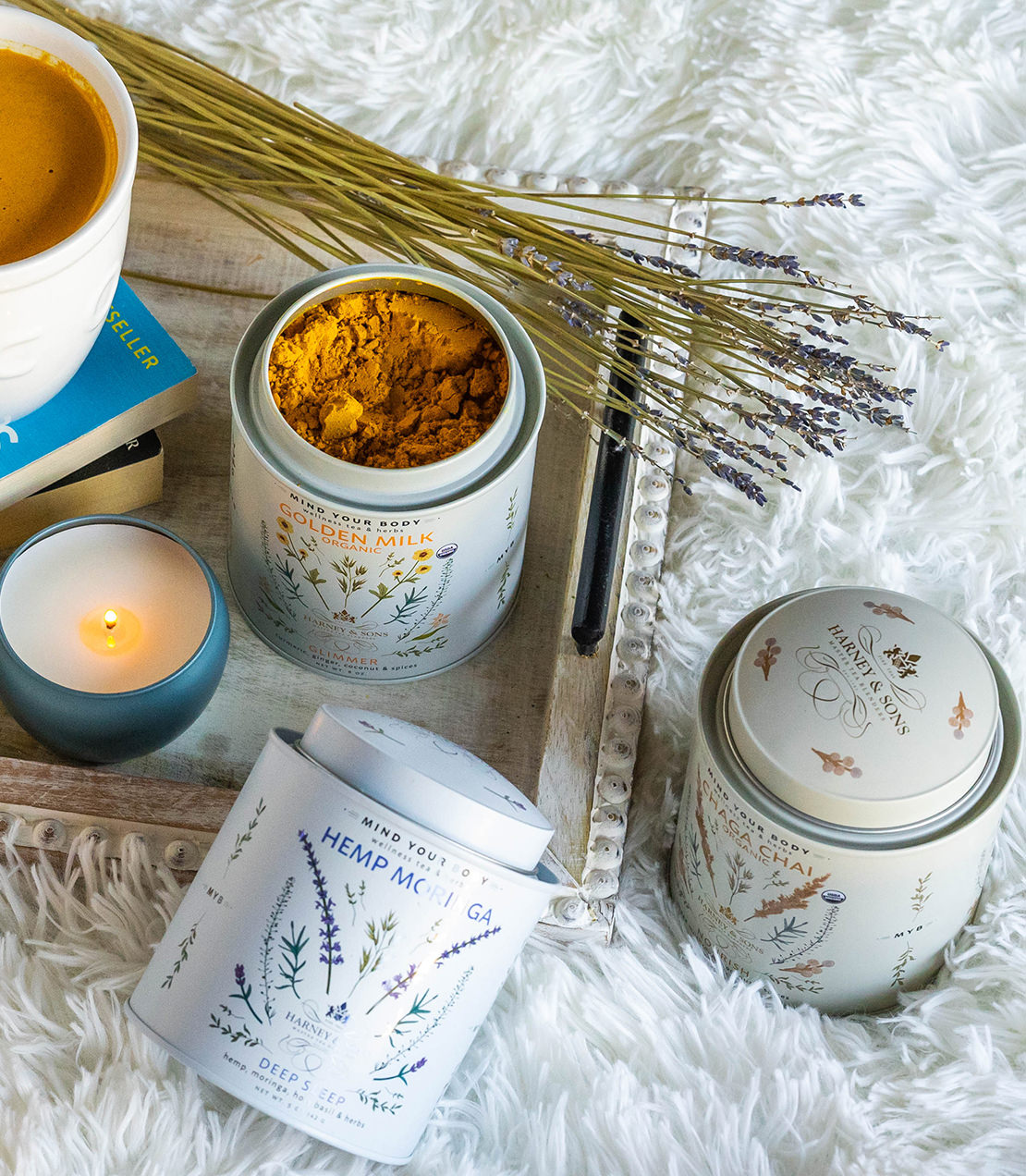Wellness Trio Gift featuring golden milk, hemp matcha, and calming herbs on a cozy white surface.