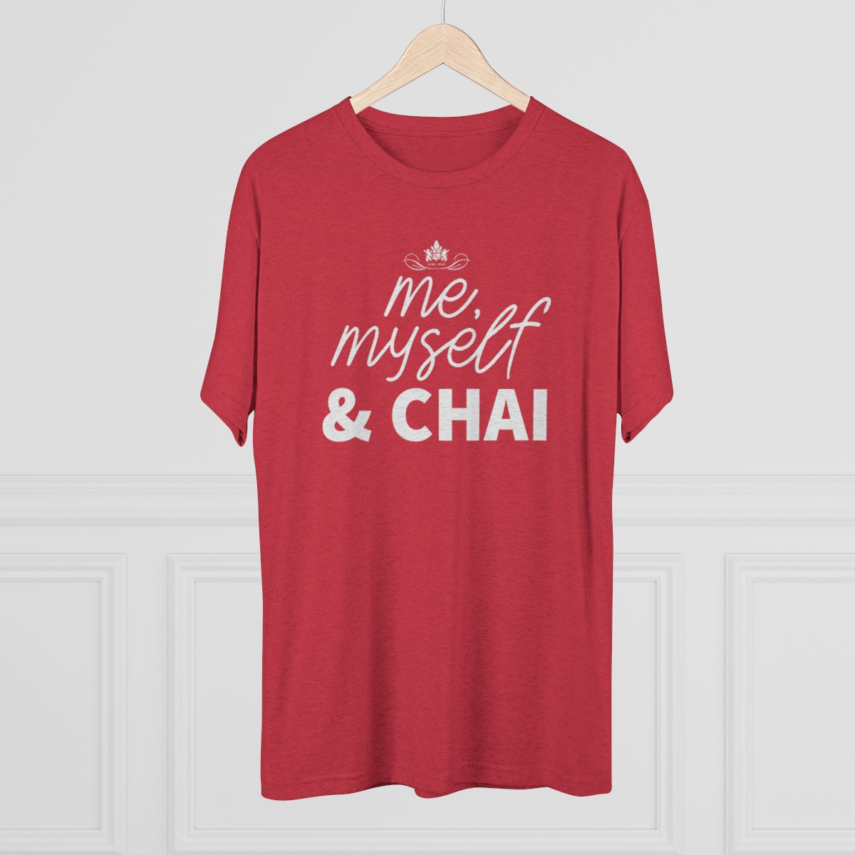 Red graphic tee featuring the text "me, myself & CHAI" in a stylish font, perfect for tea lovers.