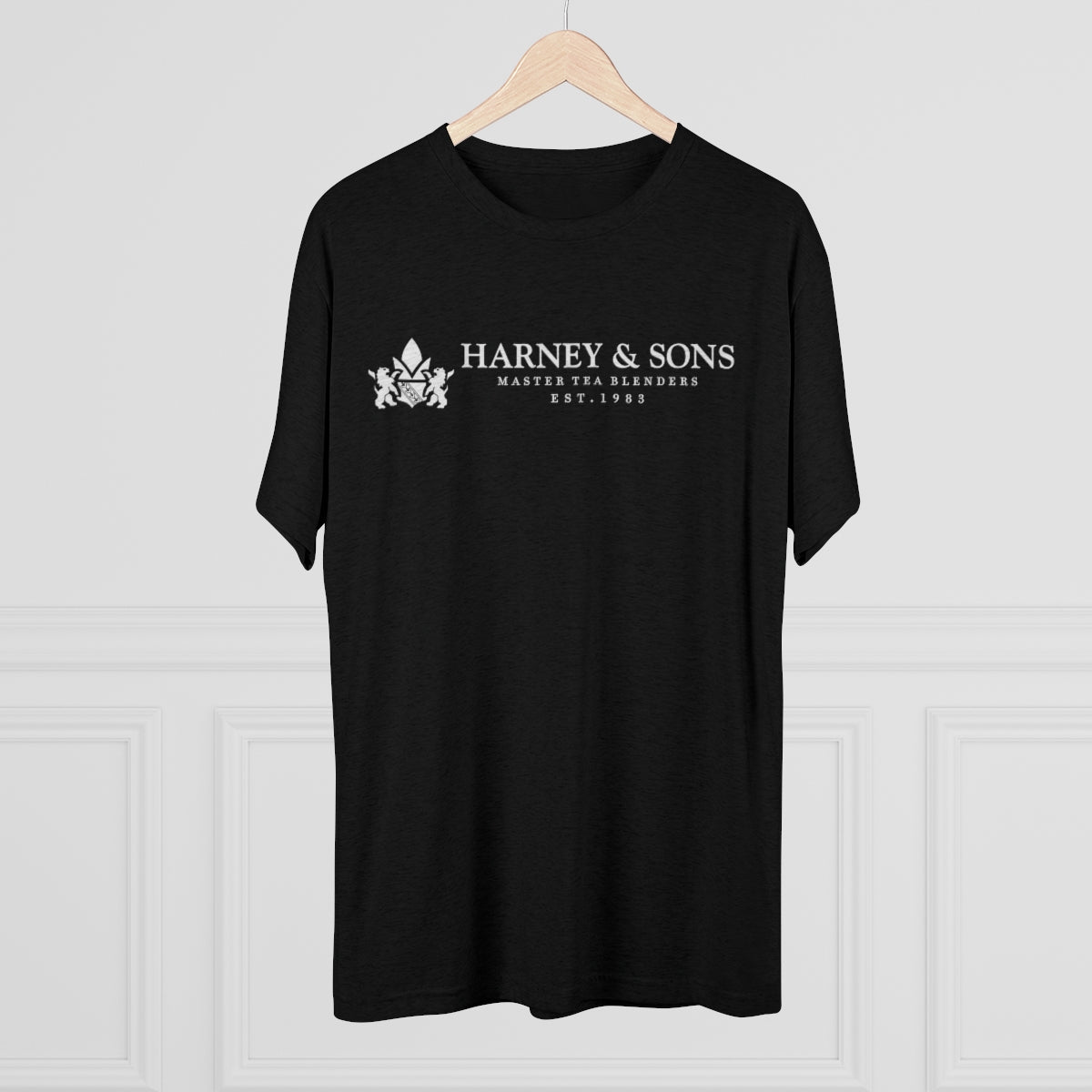 Black graphic tee featuring "Harney & Sons Master Tea Blenders Est. 1983" in white text. Perfect for tea enthusiasts.