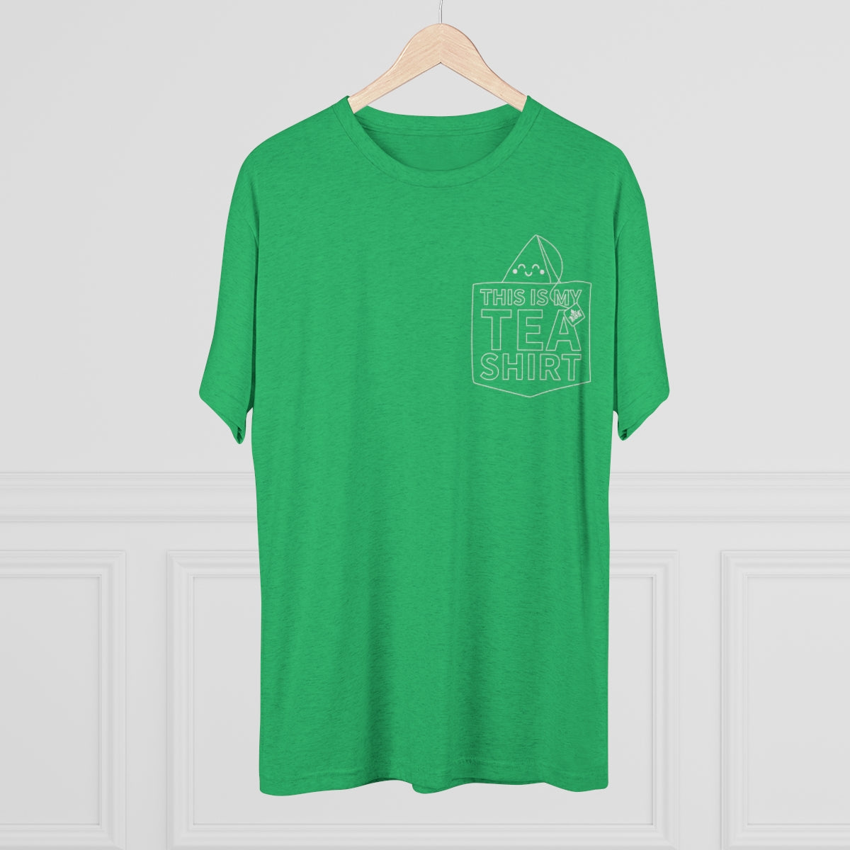 Green graphic tee featuring the text "This Is My Tea Shirt" with a tea bag illustration. Perfect for tea lovers.
