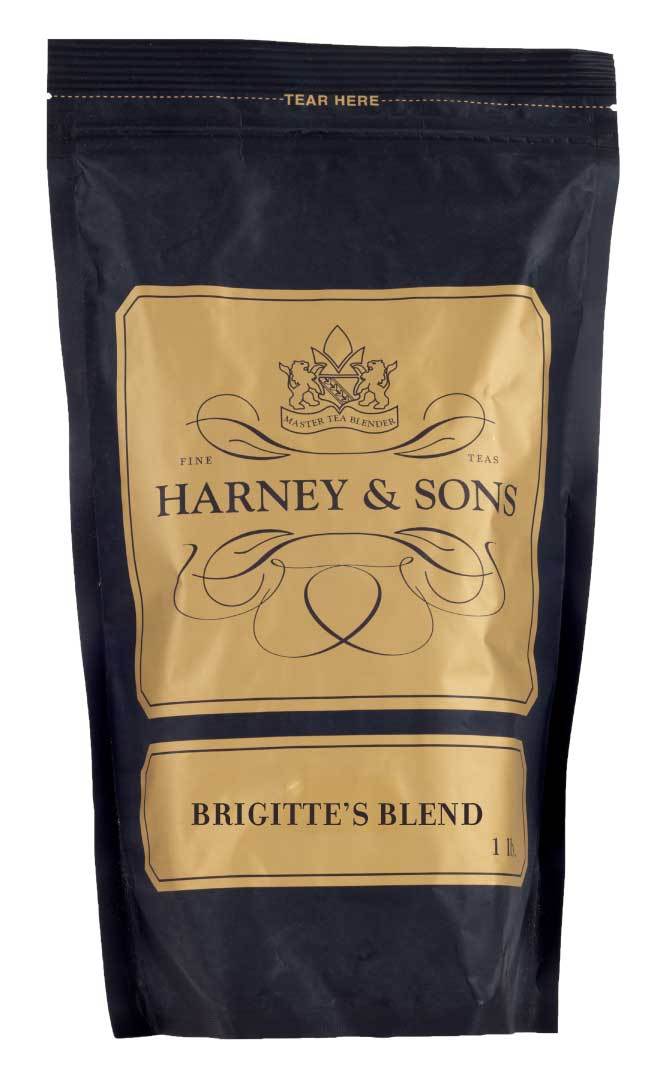 Black tea packaging for Brigitte's Blend by Harney & Sons, featuring elegant gold accents and a tear-off top.