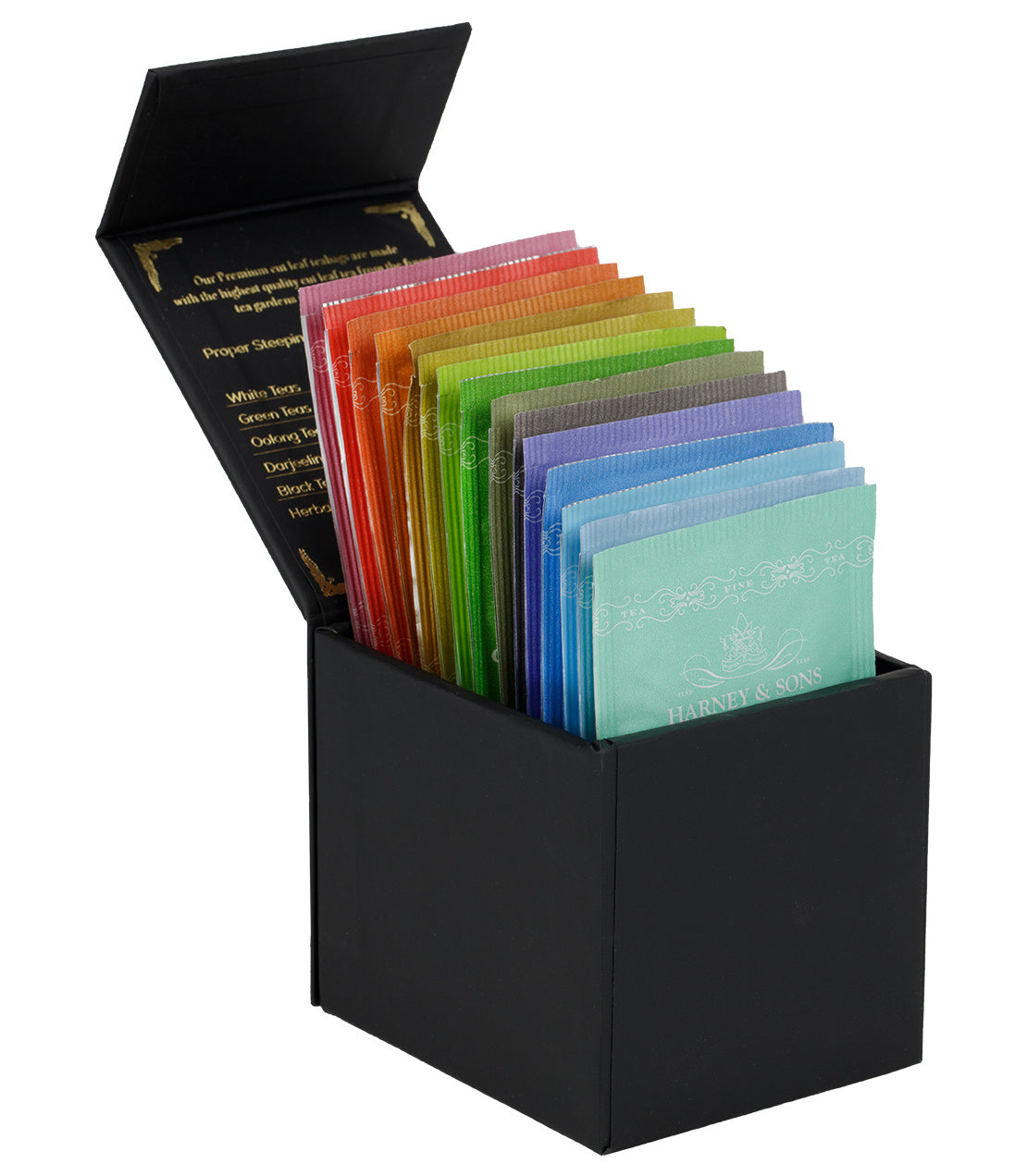 Harney Heritage teabag sampler in a black box, featuring colorful tea sachets arranged neatly inside.