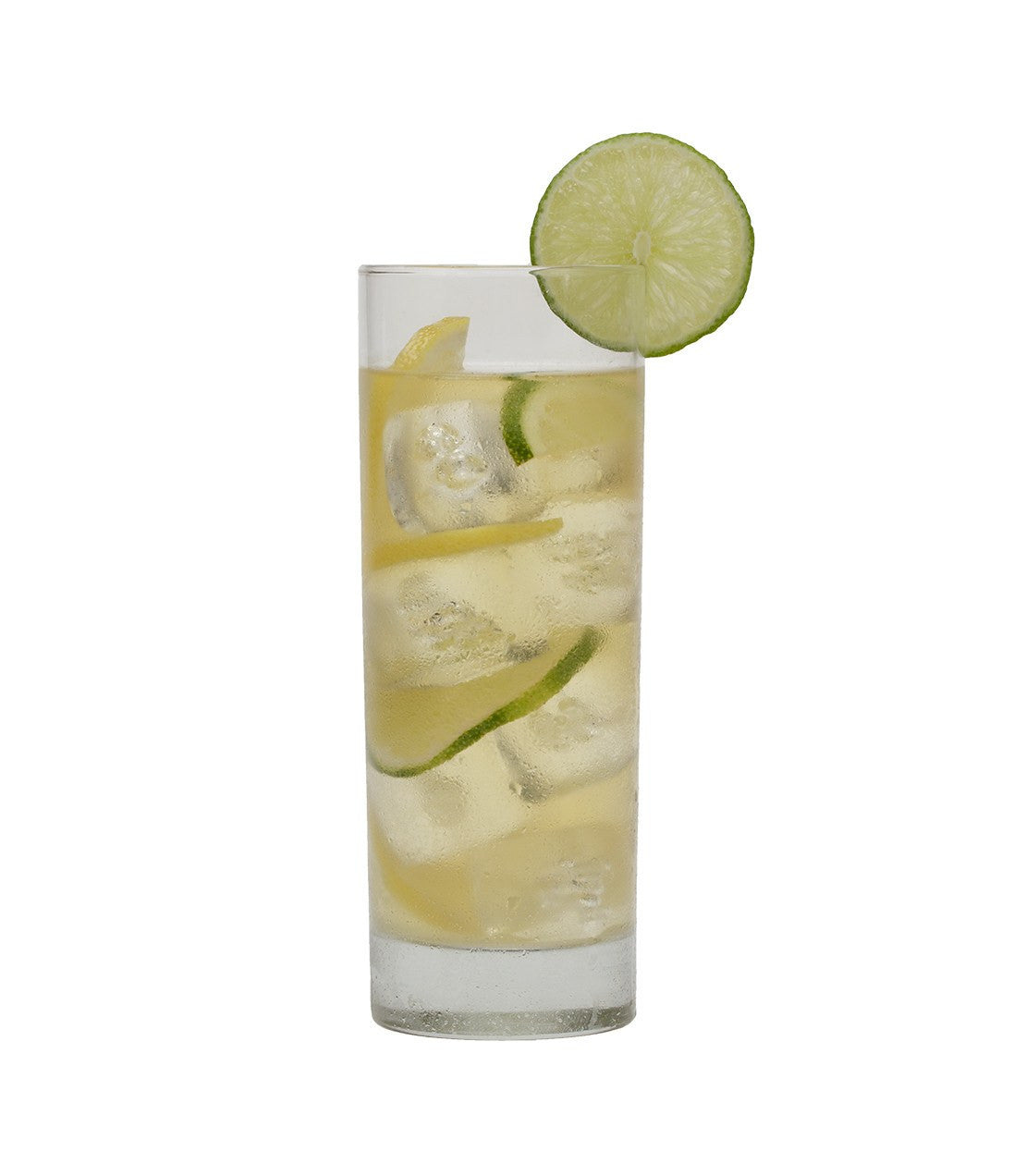 Tall glass of organic green iced tea with coconut, garnished with lime slices and ice cubes. Refreshing beverage.