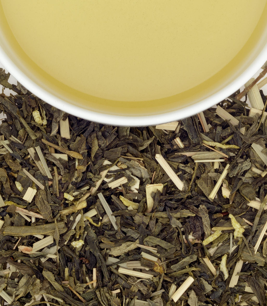 Organic Bangkok tea sachets, featuring a blend of green tea and lemongrass, with brewed tea in a cup above.