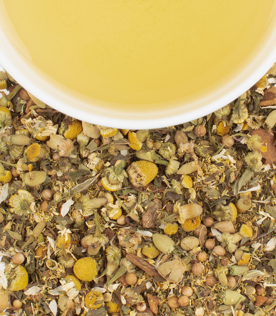 "Death on the Nile herbal tea blend in a tin, with loose herbs and a cup of brewed tea above.