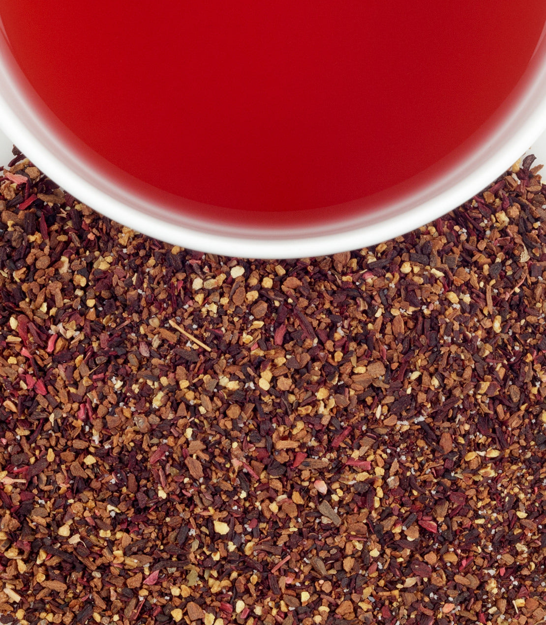 Organic Passion Plum tea sachets in a bag, with a vibrant red brew and loose tea blend displayed below.
