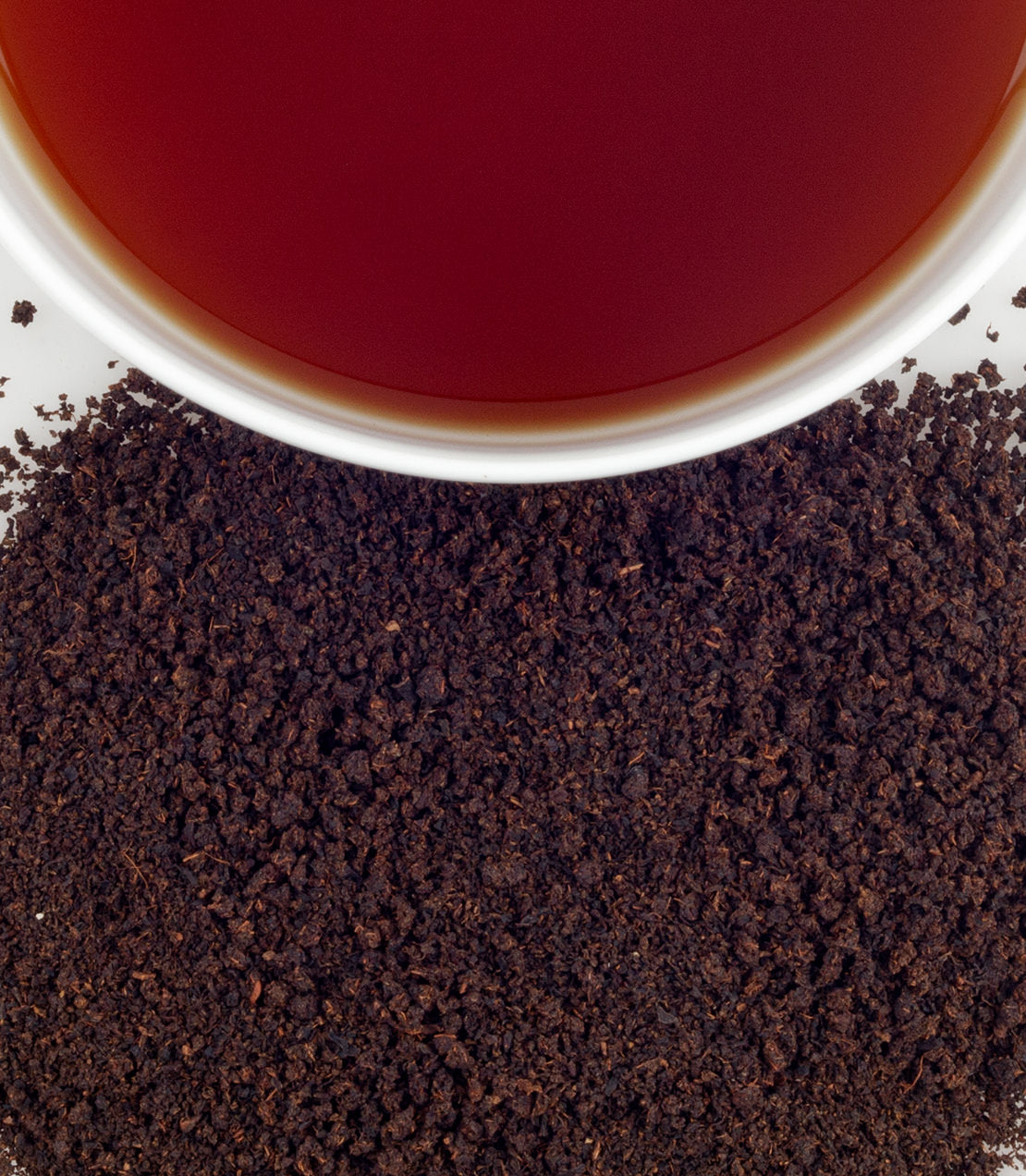 SGS Special English Breakfast tea in a bag of 50 sachets, with brewed tea and loose tea leaves displayed.