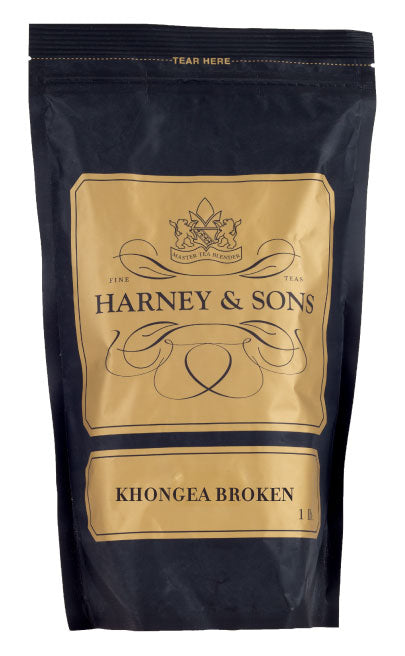 Black tea packaging for Harney & Sons Khongea Broken, featuring a gold and black design with a tear-off top.