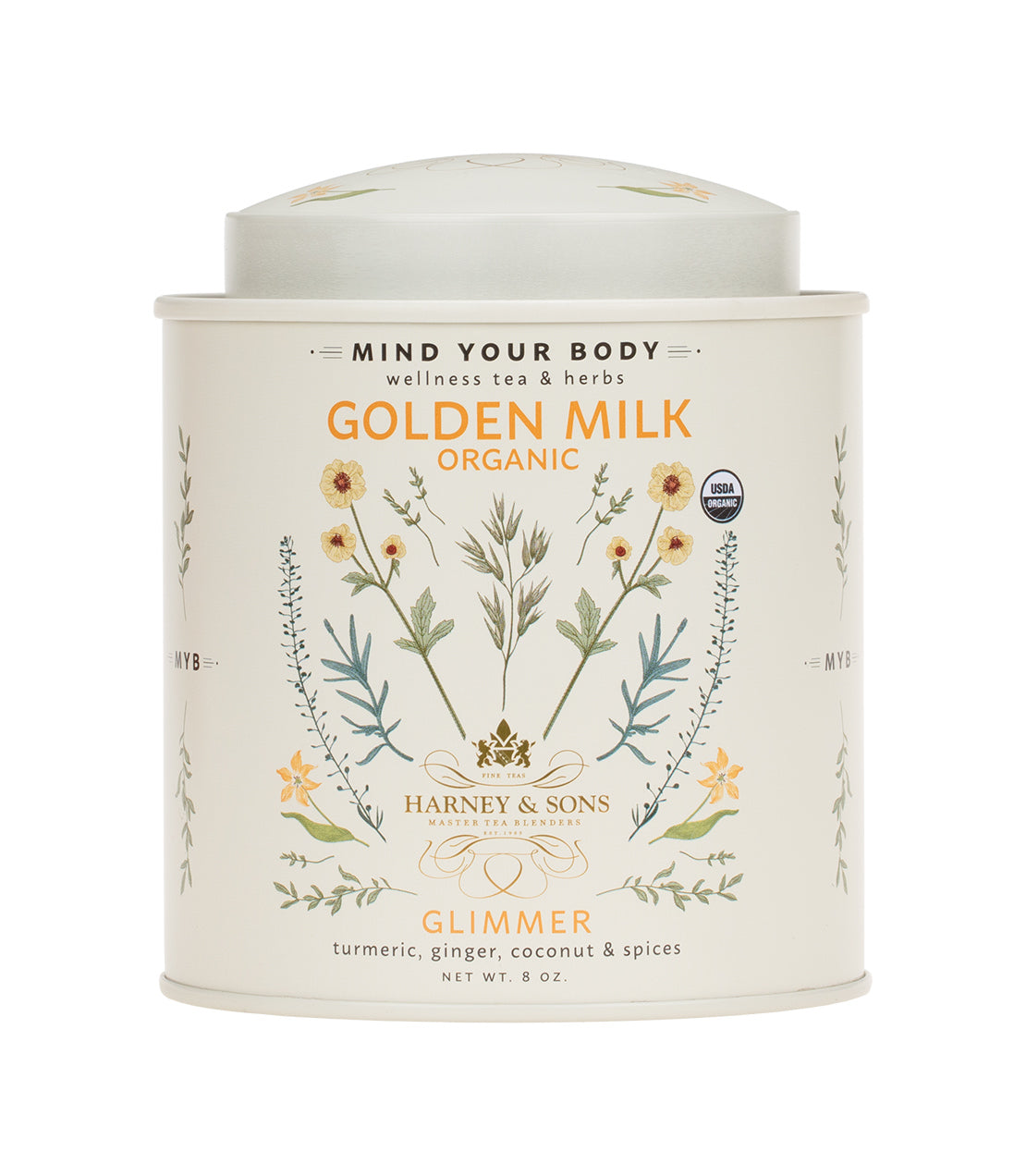 Organic Golden Milk blend by Harney & Sons, featuring turmeric, ginger, coconut, and spices in a decorative tin.