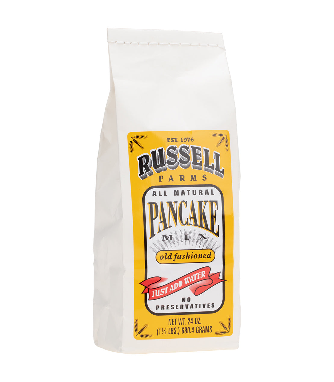 Russell Farms all-natural pancake mix bag, 24 oz, featuring "just add water" instructions and assorted flavors.