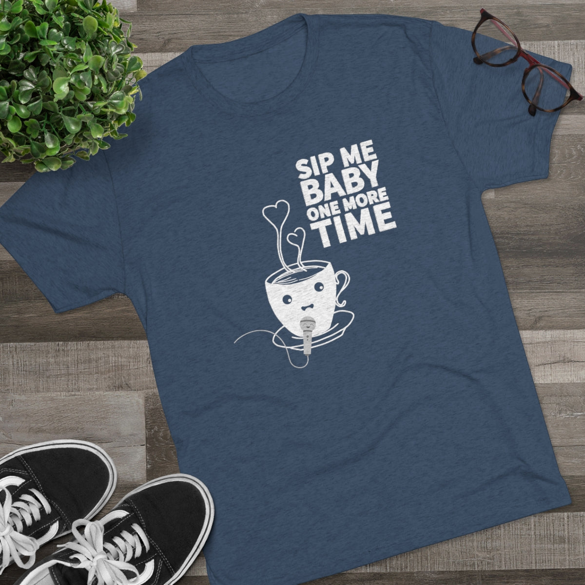Navy graphic tee featuring a playful coffee cup design with the text "Sip Me Baby One More Time.